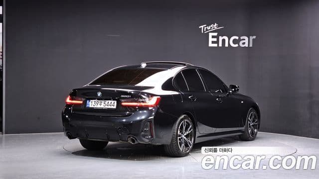 BMW 3 Series 2023 — Фото 1/20