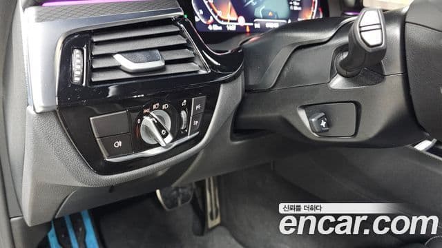 BMW 5 Series 2023 — ფოტო 13/31
