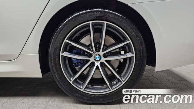BMW 5 Series 2023 — ფოტო 22/31