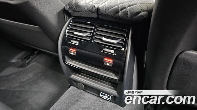 BMW 5 Series 2023 — ფოტო 16/31