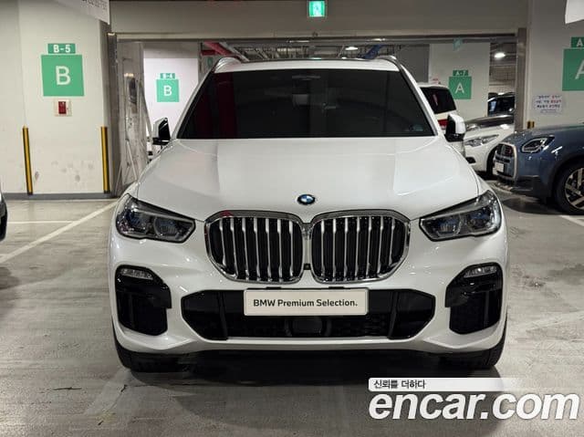 BMW X5 2021 — ფოტო 9/20