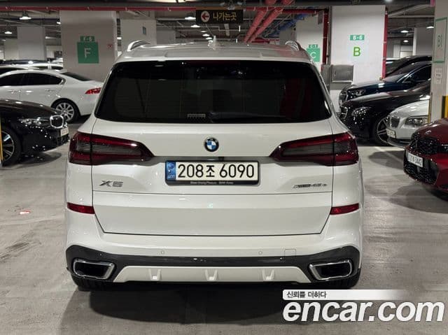 BMW X5 2021 — ფოტო 17/20
