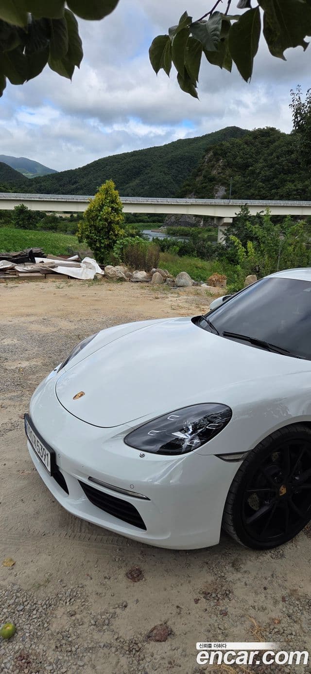 Porsche 718 Cayman 2019 — Фото 1/20