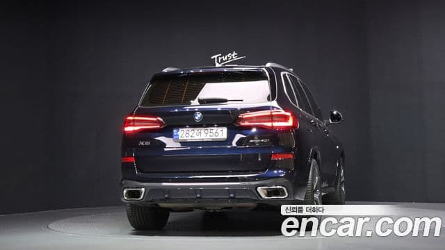 BMW X5 2023 — ფოტო 4/20