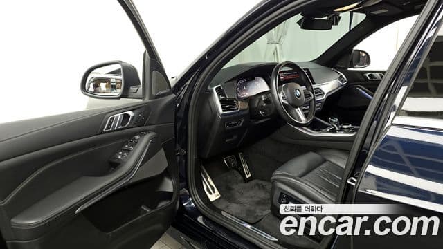 BMW X5 2023 — ფოტო 10/20