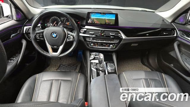 BMW 5 Series 2018 — Фото 7/20