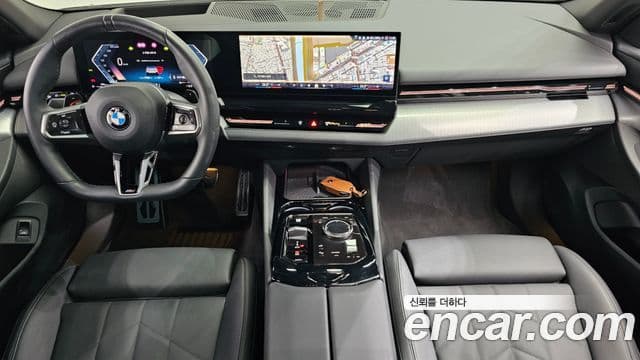 BMW 5 Series 2023 — ფოტო 7/20