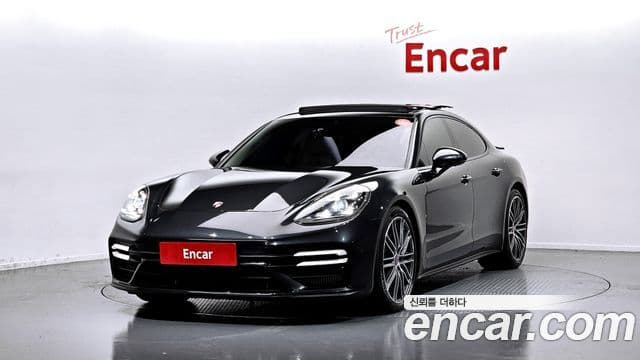 Porsche Panamera 2021 — Фото 1/20