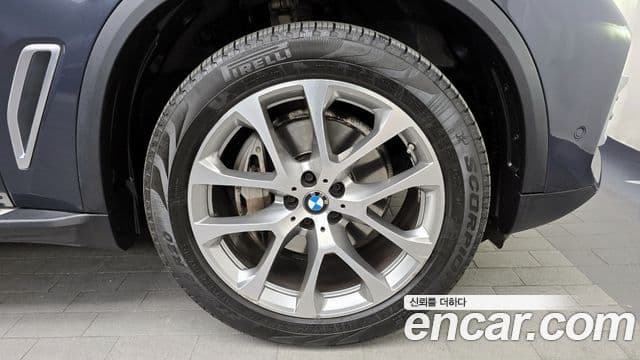 BMW X5 2021 — ფოტო 5/20