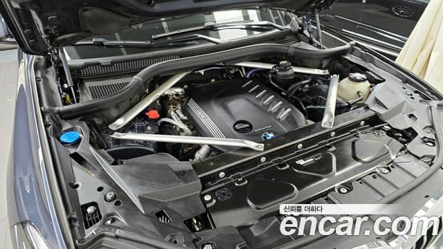 BMW X5 2021 — ფოტო 6/20