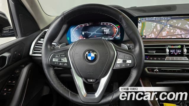 BMW X5 2021 — ფოტო 13/20