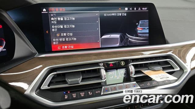 BMW X5 2021 — ფოტო 16/20