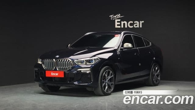 BMW X6 2021 — Фото 1/20