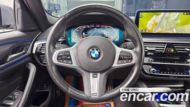 BMW 5 Series 2023 — ფოტო 14/20