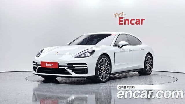 Porsche Panamera 2021 — Фото 1/20
