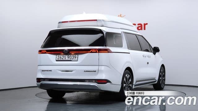 Kia Carnival 2021 — ფოტო 2/20