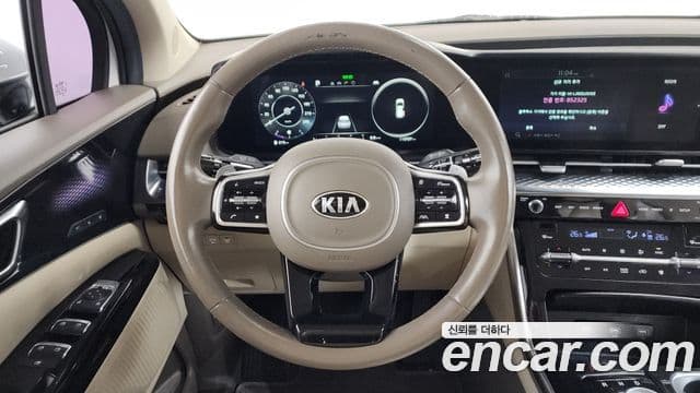 Kia Carnival 2021 — ფოტო 13/20