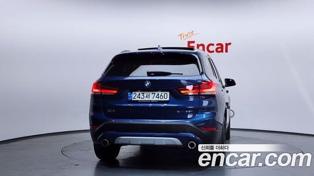 BMW X1 2021 — ფოტო 4/20