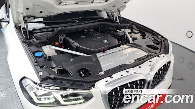 BMW X4 2022 — ფოტო 6/20