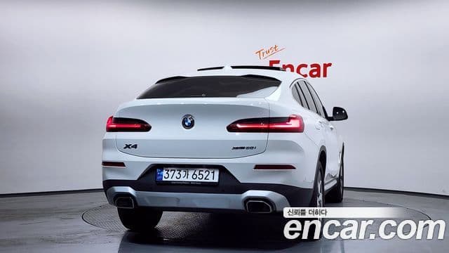 BMW X4 2023 — ფოტო 4/20