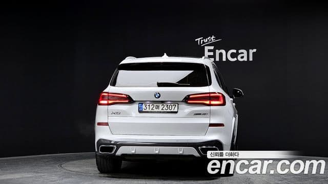 BMW X5 2022 — ფოტო 4/20