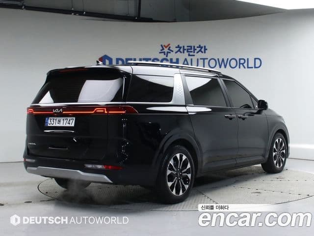 Kia Carnival 2023 — ფოტო 2/20