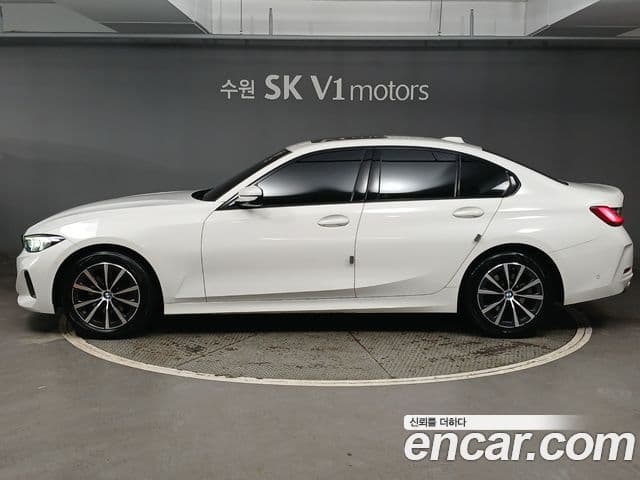 BMW 3 Series 2023 — Фото 1/20
