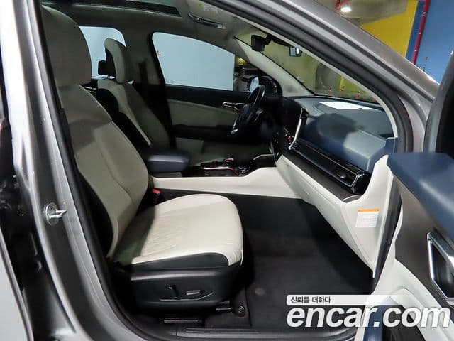 Kia Sportage 2021 — ფოტო 7/20