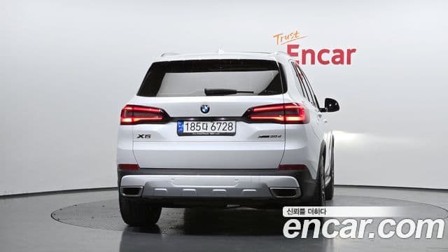 BMW X5 2022 — ფოტო 4/20