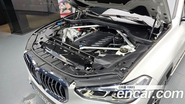BMW X5 2022 — ფოტო 6/20