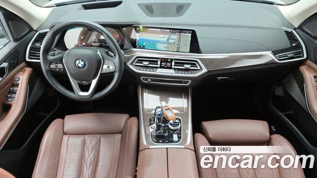 BMW X5 2022 — ფოტო 7/20