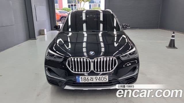 BMW X1 2021 — Photo 6/14