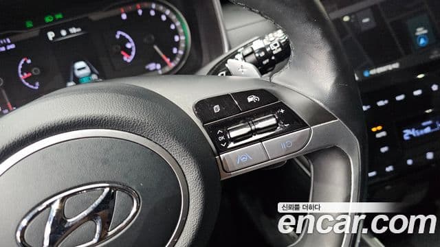 Hyundai Tucson Hybrid 2022 — ფოტო 8/20