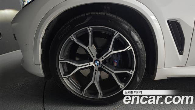 BMW X5 2022 — ფოტო 4/20