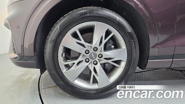 Genesis GV70 2021 — ფოტო 18/20