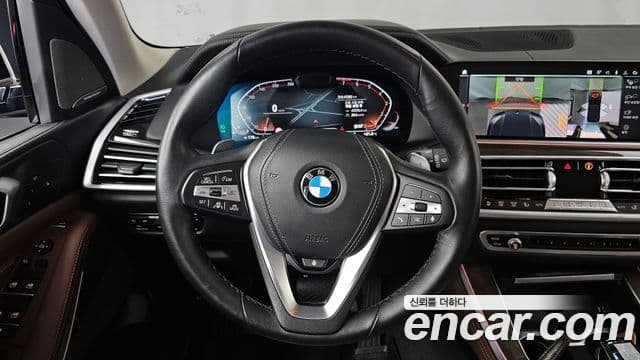 BMW X5 2021 — ფოტო 13/20