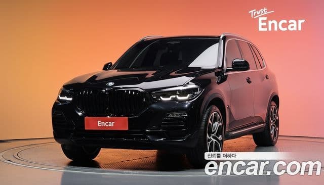 BMW X5 2021 — ფოტო 1/20