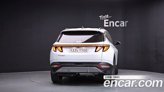 Hyundai Tucson Hybrid 2021 — ფოტო 1/20