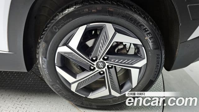 Hyundai Tucson Hybrid 2021 — ფოტო 12/20