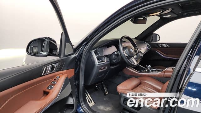 BMW X5 2021 — ფოტო 10/20