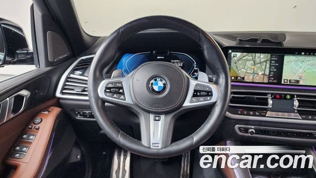 BMW X5 2021 — ფოტო 13/20