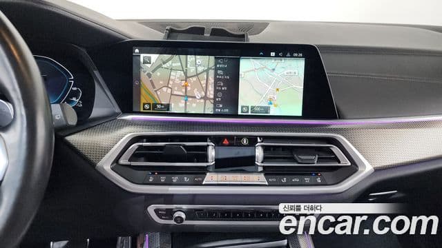 BMW X5 2021 — ფოტო 14/20