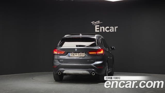 BMW X1 2021 — ფოტო 4/20