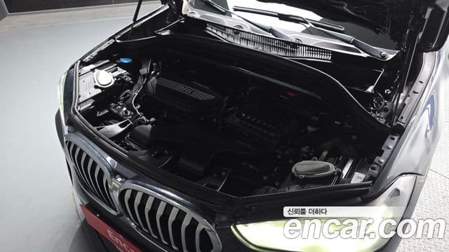 BMW X1 2021 — ფოტო 6/20