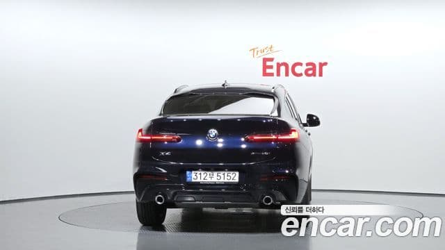 BMW X4 2021 — ფოტო 4/20