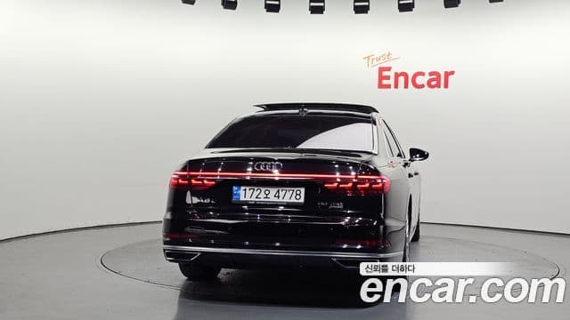 Audi A8 2021 — Фото 4/20