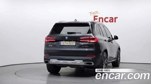 BMW X5 2022 — ფოტო 4/20