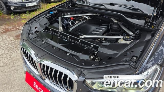 BMW X5 2022 — ფოტო 6/20