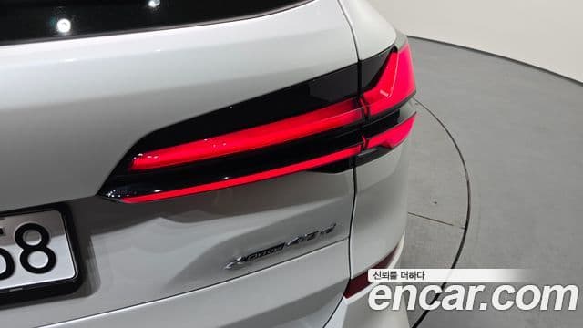 BMW X5 2025 — ფოტო 28/36