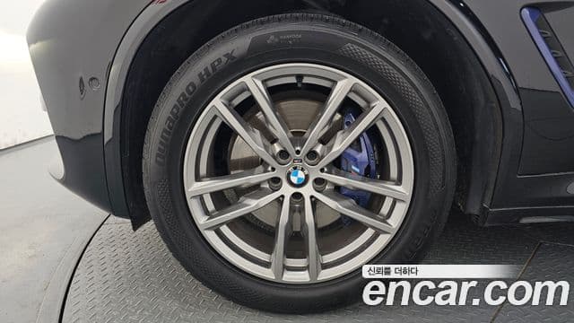 BMW X3 2019 — ფოტო 32/34